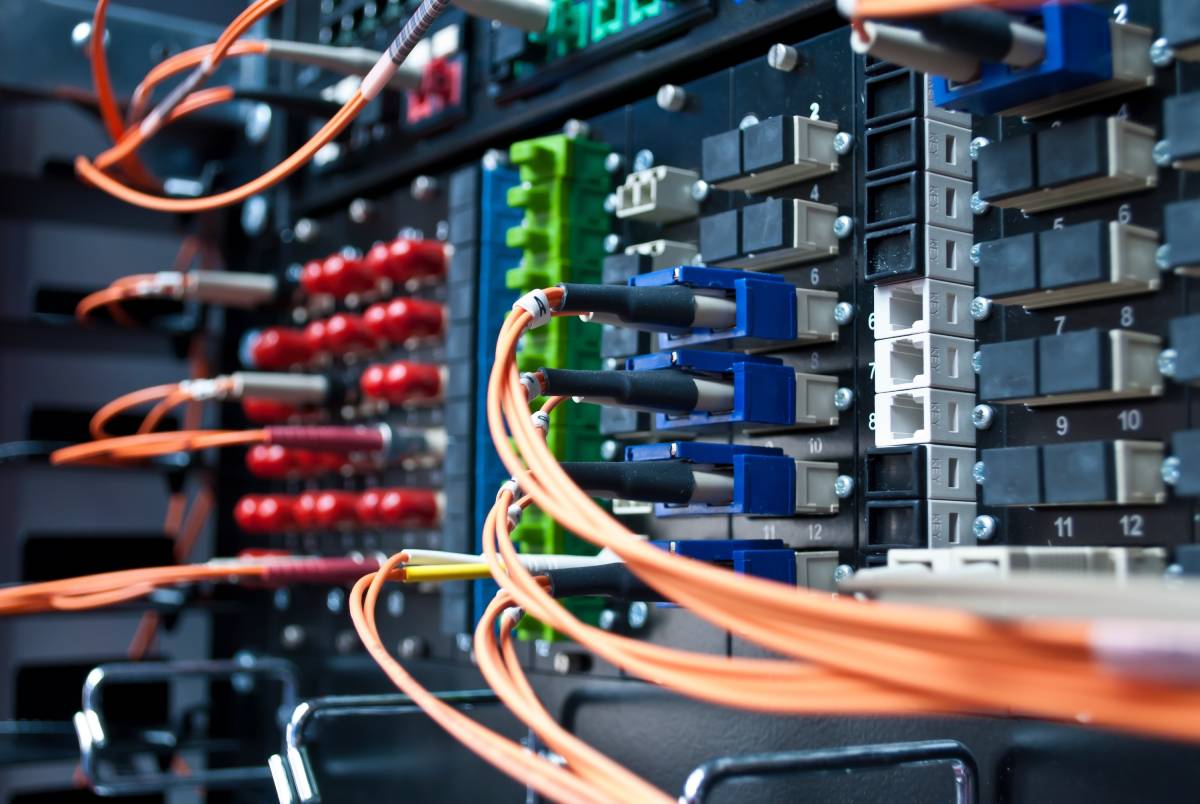 Orange cables neatly arranged and plugged in