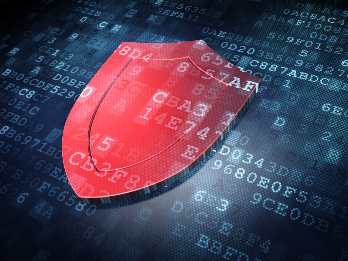 A red shield over code