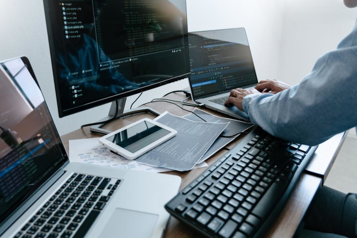 Programmer working on computers