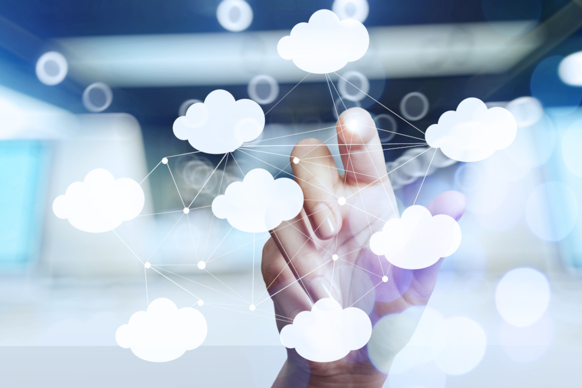 Man touching digital cloud
