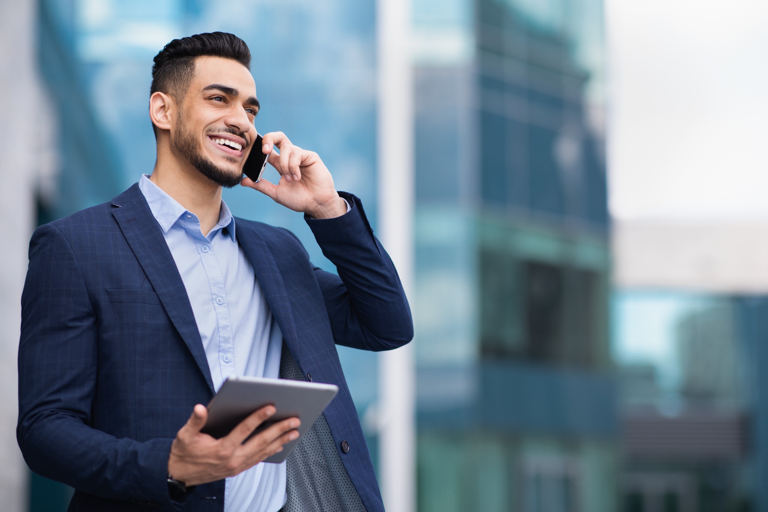 Businessmen talking on phone